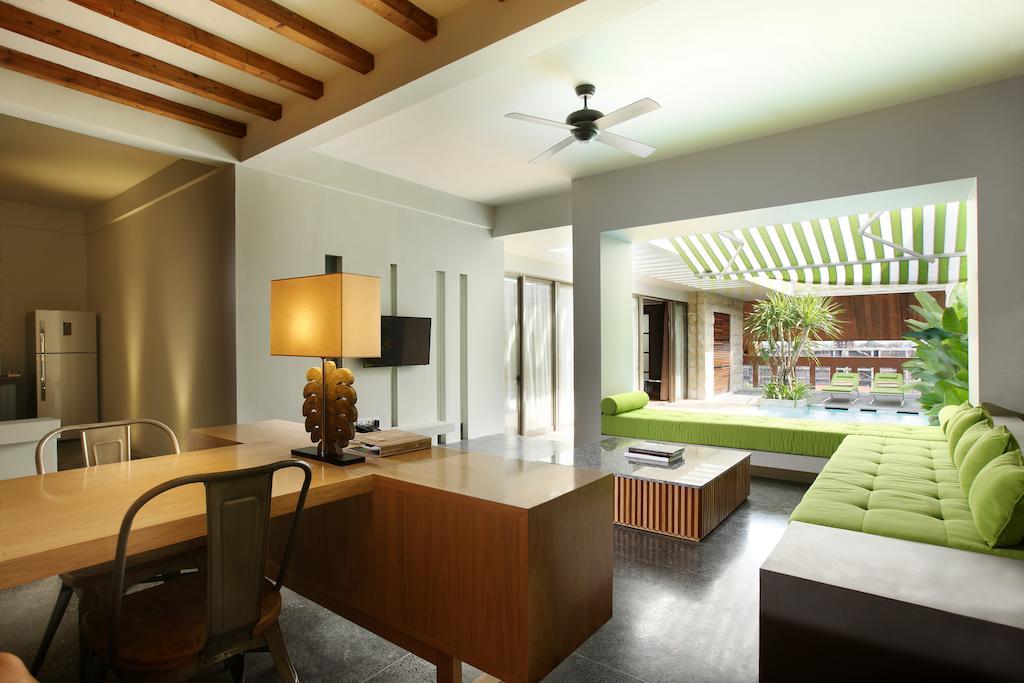 Ts Suites Seminyak Chambre photo Interior of a villa at the resort