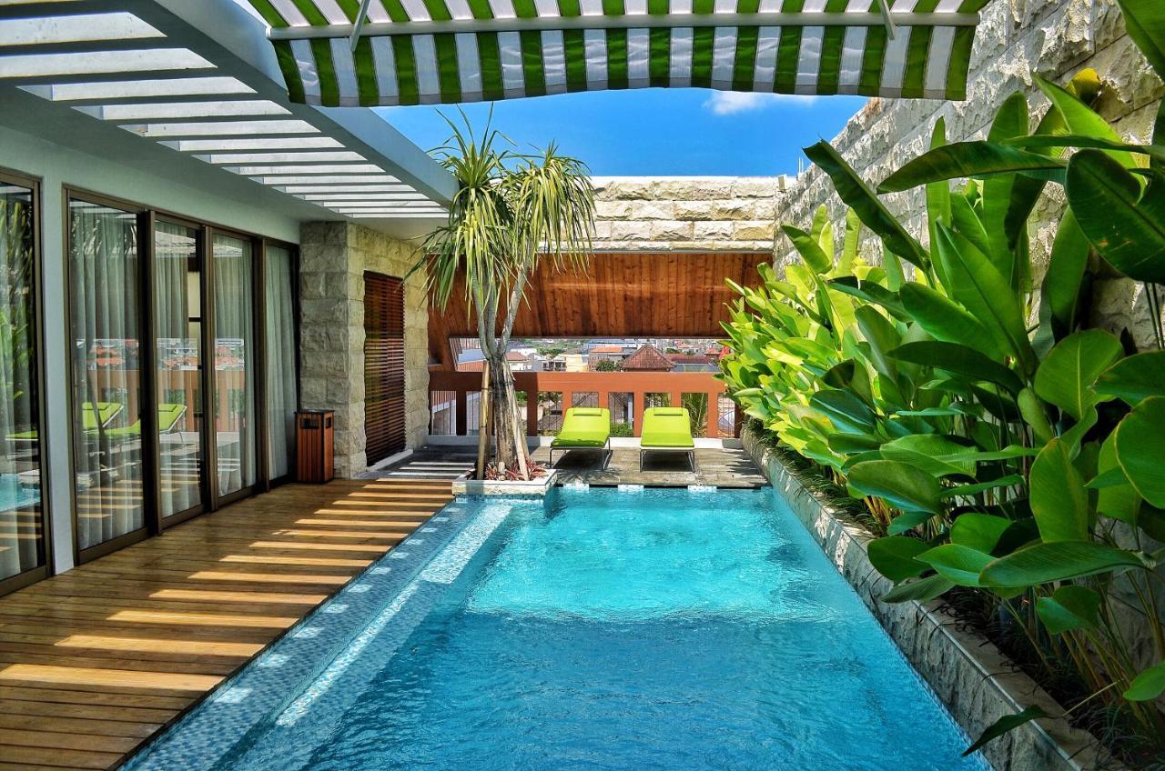 Ts Suites Seminyak Extérieur photo The swimming pool at the hotel